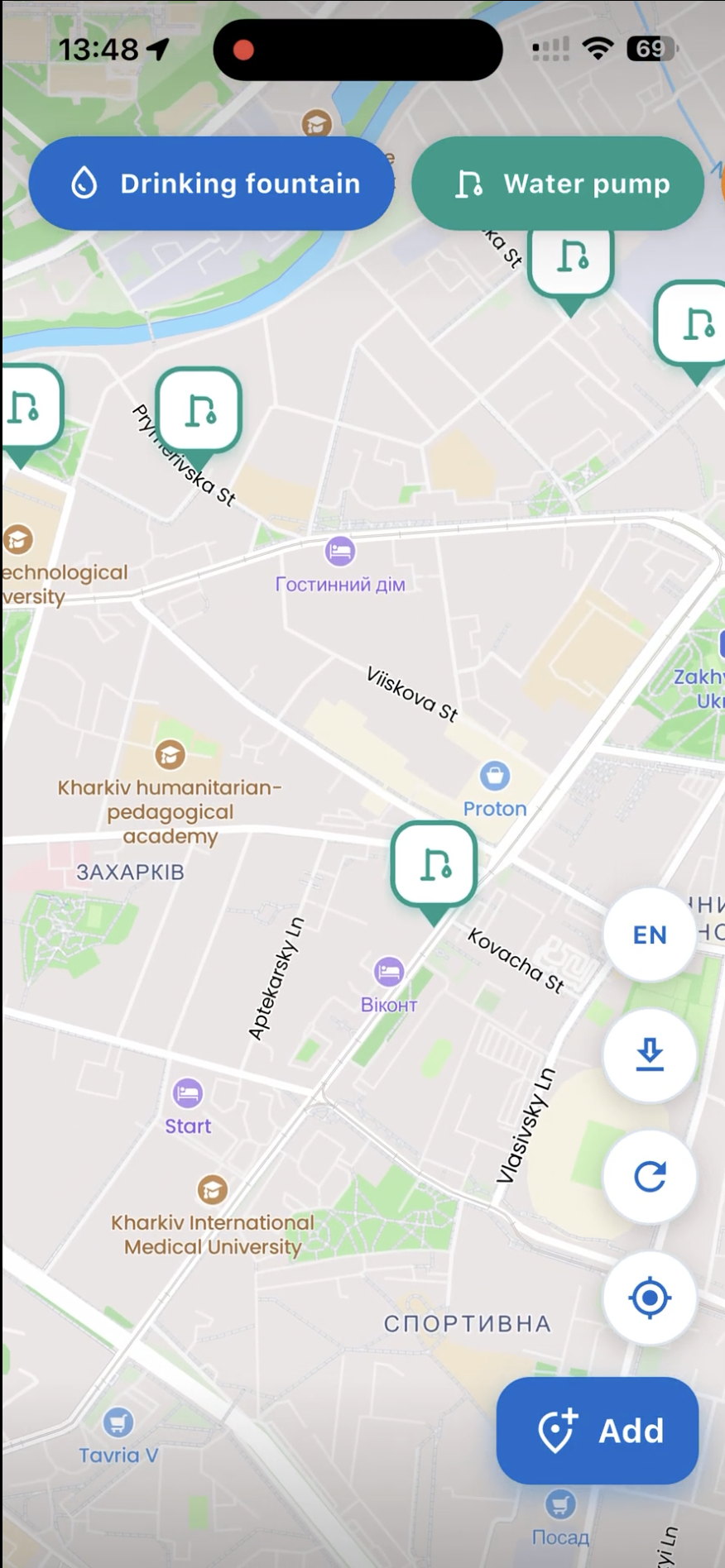 The deVoda map on iOS: drinking-fountain and water-pump filter pills over a map of Kharkiv, pins marking each water point, and an Add button for reporting a new one