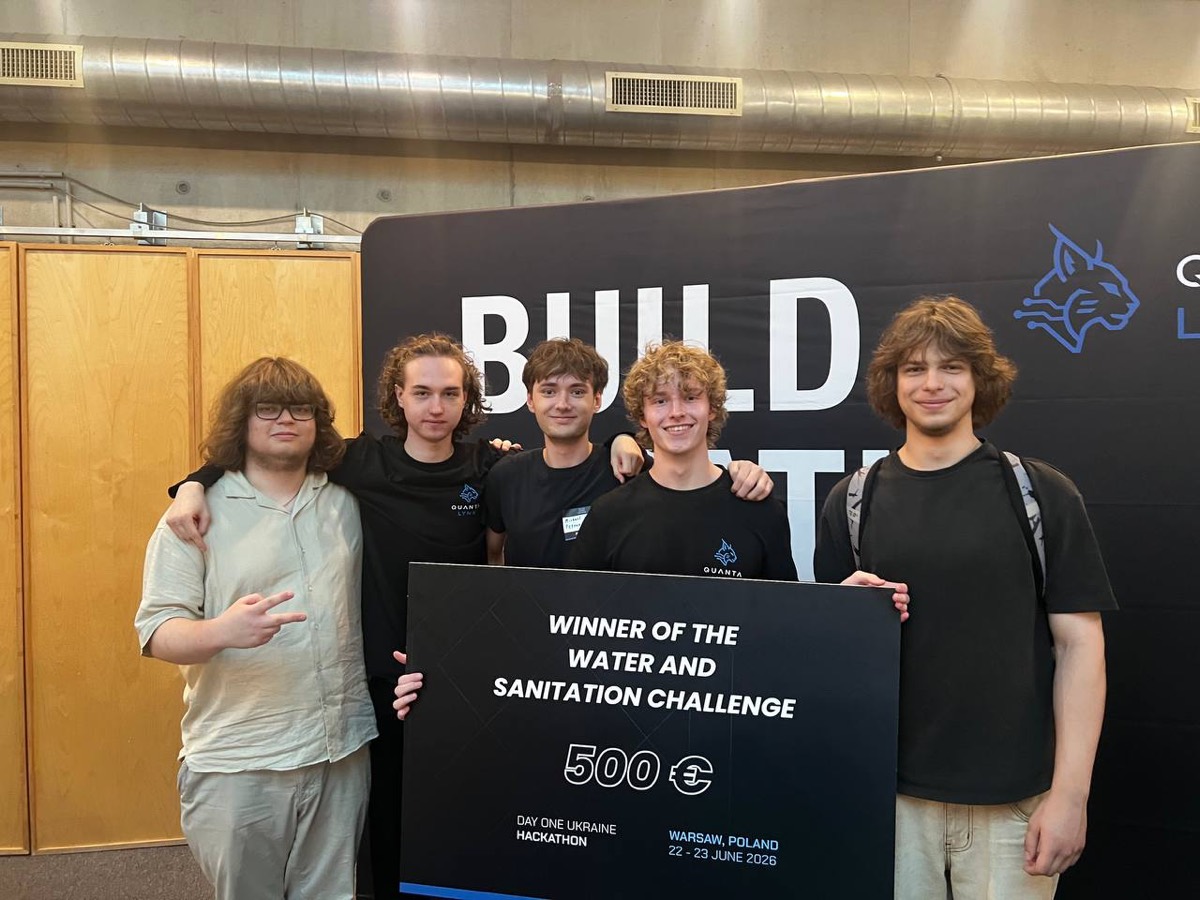 The five-person deVoda team holding the winners&rsquo; board for the water and sanitation challenge, Warsaw, 22&ndash;23 June 2026