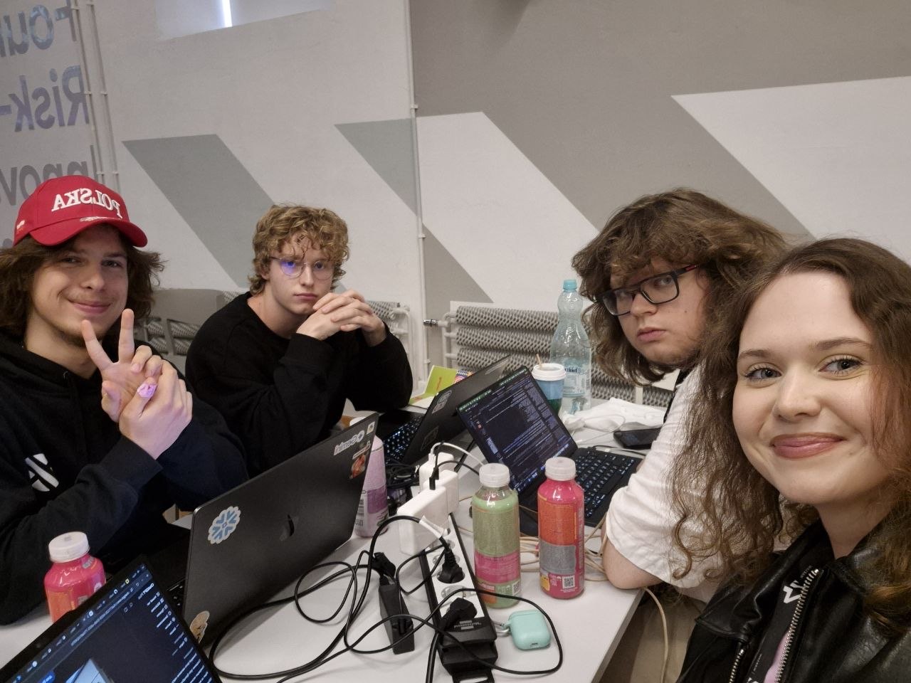 The Slotwise team working at a table of laptops during the Codaro Coding Challenge II